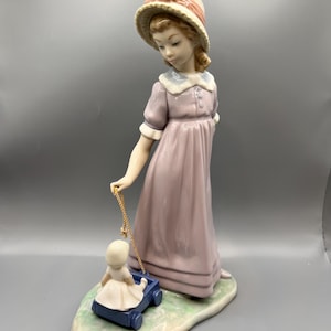 Retired Lladro Girl with Toy Wagon Figurine: Spanish Porcelain Collectible