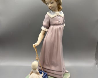 Vintage  Lladro Girl with Toy Wagon Figurine: Spanish Porcelain Collectible Lladro Nursery Decor