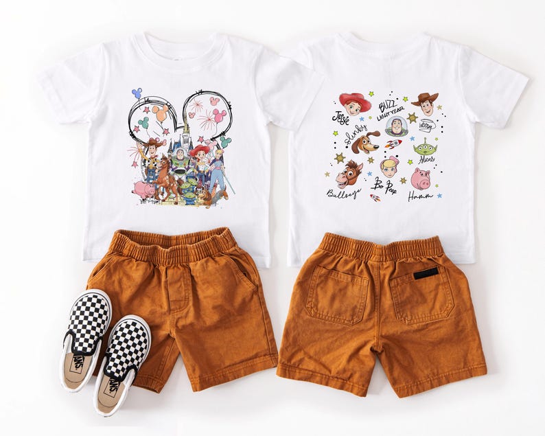 May include: Two white t-shirts with cartoon character graphics, paired with orange shorts and black and white checkered slip-on shoes. The shirts feature characters from a popular animated movie.