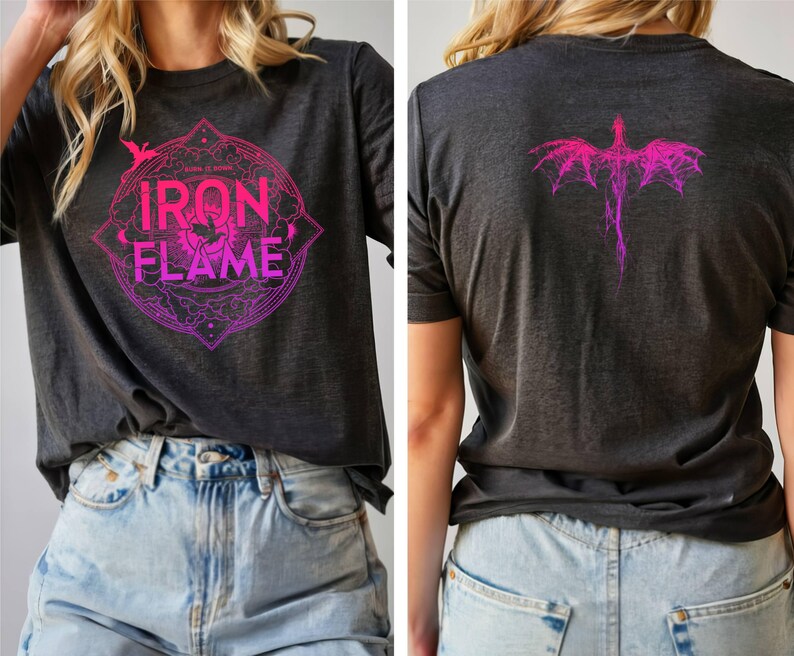 May include: A dark gray t-shirt with a pink and purple graphic design featuring a dragon and the text "Iron Flame".