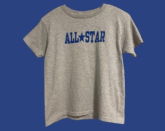 women's baby tee with aesthetic, trendy, relatable design.