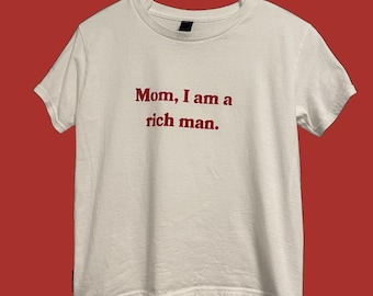 women's baby tee with aesthetic, trendy, relatable design.