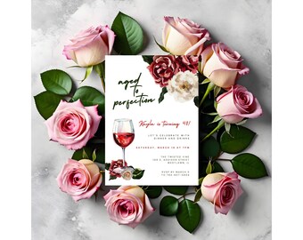 May include: A white invitation card with black and red text that reads "aged to perfection" and "Kayla is turning 40!"  The card features a watercolor illustration of a glass of red wine and pink roses.