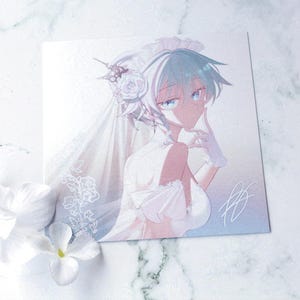 May include: Square print featuring an anime-style character in a white wedding dress and veil. The character has light blue hair and is holding a finger to their lips. White flowers are in the foreground. The print is on a marble surface.