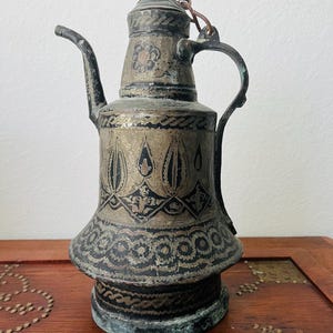 antique ottoman Middle Eastern copper jug .