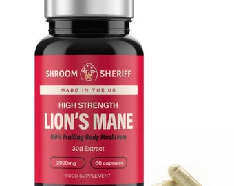 May include: A black bottle with a silver cap and a red label featuring the text "SHROOM SHERIFF" and "LION'S MANE." The label also states "MADE IN THE UK" and "FOOD SUPPLEMENT." Two capsules are next to the bottle. The capsules are light brown.