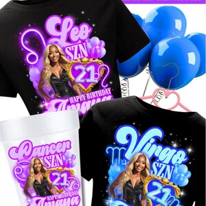 May include: Black t-shirts and a cup with birthday designs. The shirts feature a woman's image, zodiac signs, the number 21, and the name "Amaya." Blue balloons and a pink hanger are also visible.