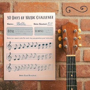 Könnte beinhalten: Eine Musik-Challenge-Tabelle mit dem Text "30 DAYS OF MUSIC CHALLENGE" und einer Gitarre. Die Tabelle enthält Platz für einen Namen, ein Datum, ein Ziel und eine Belohnung. Die Gitarre hat einen Korpus und einen Hals aus Holz.