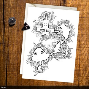 May include: Black and white line drawing of a dungeon map with a large central chamber and a smaller chamber to the right. The map is surrounded by a grid of squares.