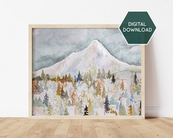 May include: Watercolor painting of a snow-capped mountain with a forest of trees in the foreground. The sky is a soft blue with gray clouds. The painting is framed in a light wood frame.