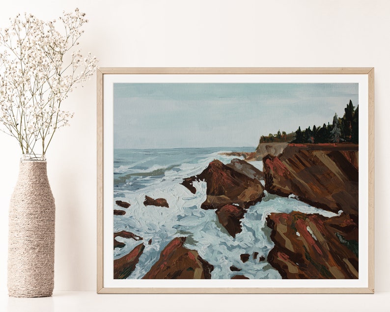 May include: A painting of a rocky coastline with crashing waves. The sky is a light blue, and the water is a turquoise color. The rocks are a mix of brown and orange.