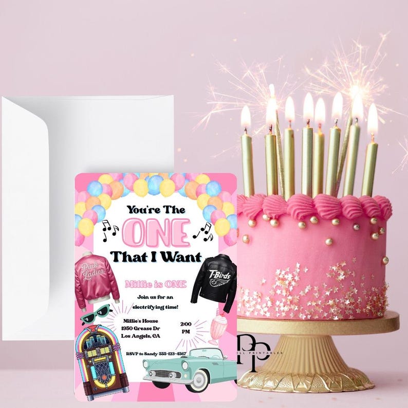 May include: A pink birthday cake with gold candles and sparklers, next to a party invitation with a pink and blue theme. The invitation includes the text "You're The ONE That I Want".