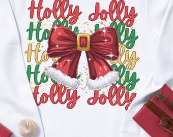 Puede incluir: Sudadera blanca con un diseño navideño rojo y verde. El diseño presenta un gran lazo rojo con detalles dorados y las palabras "Holly Jolly" repetidas en círculo.