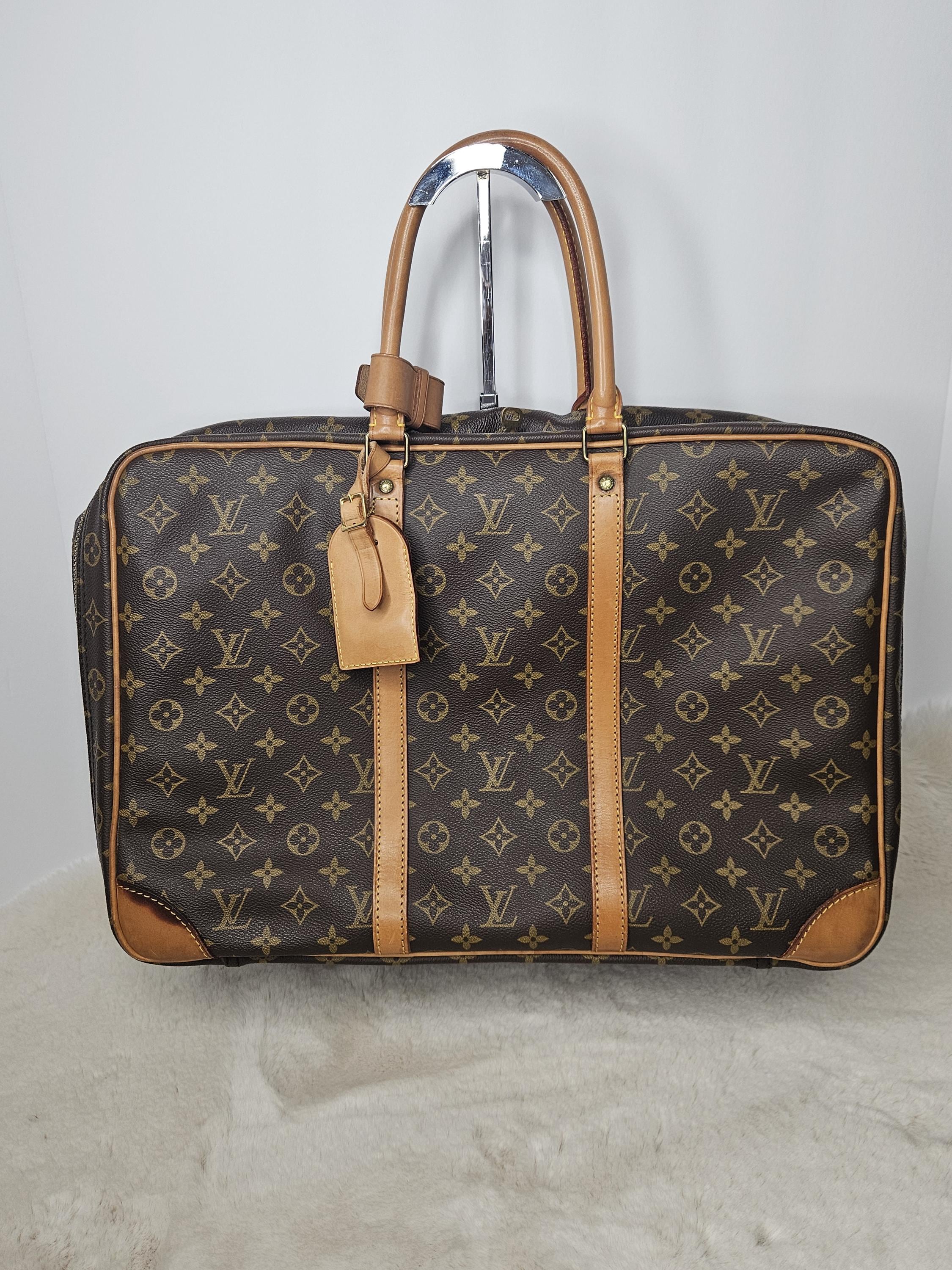 Replica designer wallet España