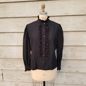 70s 80s black blouse, high necked, Victorian collar, polyester, ruffled collar, front and cuffs, 46
