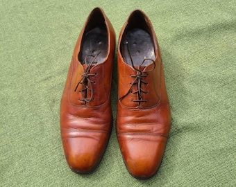 11 mens brown cap toe shoes, leather bottoms,  Florsheim vintage