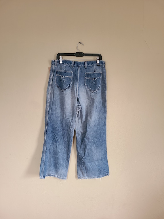 70s jeans, baggy Wrangler, well worn in, blue jean