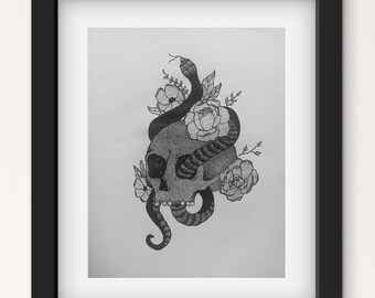 May include: Black framed art print featuring a detailed grayscale illustration. The artwork depicts a human skull entwined by a snake, with floral accents. The snake's body is wrapped around the skull, and flowers are placed around the skull.