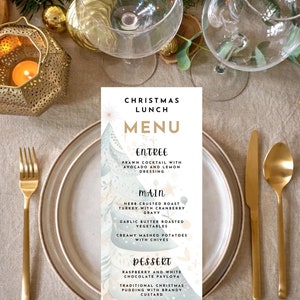 May include: A Christmas lunch menu with a festive design. The menu features a prawn cocktail entree, herb-crusted roast turkey main course, and a raspberry and white chocolate pavlova dessert. The text reads "Christmas Lunch Menu".