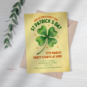 May include: A St. Patrick's Day invitation card with a watercolor shamrock design. The card has text that reads "Join us for a party this St. Patrick's Day" and details for the event. The card is on a light brown envelope.