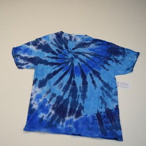 Spiral tye dye winter abstract black, white, and light blue only