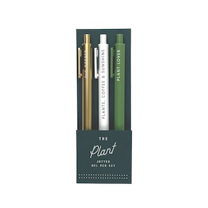May include: Set of three green, gold, and white gel pens with plant-themed text. The pens are packaged in a green box with the text "THE Plant JOTTER GEL PEN SET".