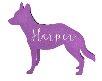 May include: A purple dog silhouette with the name "Harper" in white script. The dog is standing, with its head and tail raised. The background is plain white.