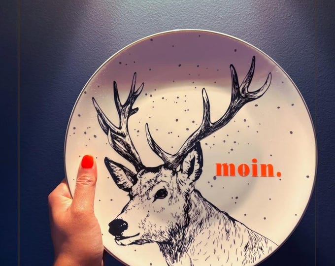 Wall plate “Moin | Kannste machen | Nützt ja nix” | Wall decoration with North German charm | Statement ceramic plate with hanging loop | 26.5 cm