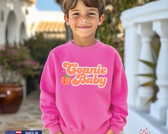 Bluza młodzieżowa z grafiką Connie Baby, koszulka młodzieżowa kibica TSITP, bluza dziecięca Team Conrad, bluza młodzieżowa z grafiką Summer Series, koszulka TSITP