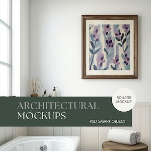 May include: A square framed print of a watercolor painting of purple flowers on a white background. The print is hanging on a white wall in a bathroom with a white bathtub and a wooden stool with a white towel. The text "SQUARE MOCKUP" is in a circle on the wall. The text "ARCHITECTURAL MOCKUPS" is in a dark green rectangle at the bottom of the image. The text "PSD SMART OBJECT" is below the rectangle.