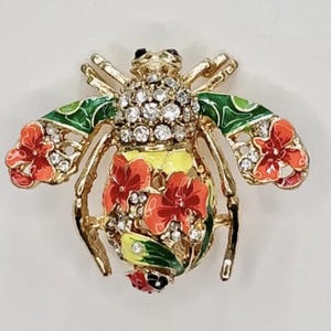 Vintage Joan Rivers Orange floral Bee Pin Brooch Rare Finds Collectibles