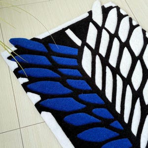 Tufted rug with anime symbol in modern neutral room decor