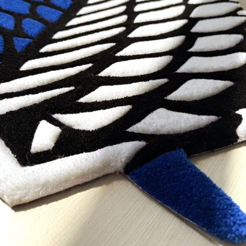 Otaku room decor rug styled near modern white desk setup