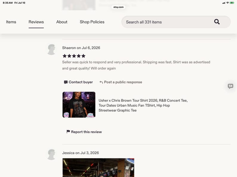 May include: A digital screenshot of an Etsy review page displaying a black graphic t-shirt featuring Usher and Chris Brown. The text reads Usher x Chris Brown Tour Shirt 2026, R&B Concert Tee, Tour Dates Urban Music Fan TShirt, Hip Hop Streetwear Graphic Tee.