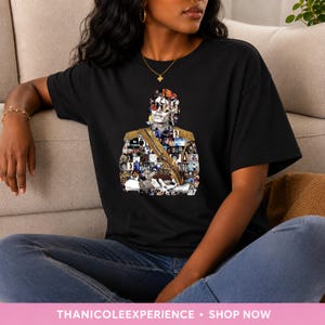 May include: A black short-sleeved t-shirt featuring a graphic print of a person wearing a military-style jacket with gold epaulets and sunglasses. The graphic is composed of a collage of smaller images. The shirt has a crew neckline and a relaxed fit.