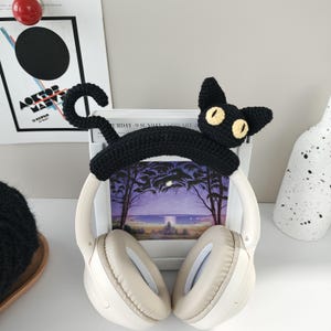 あらゆるヘッドセットにカスタマイズ可能な黒猫のヘッドフォンカバー