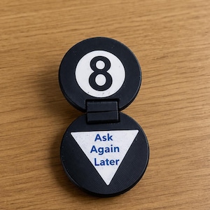 May include: A set of three ceramic mugs with a speckled, matte finish. Each mug features a different color: light blue, cream, and gray. The mugs have a simple, modern design with a rounded shape and a comfortable handle.