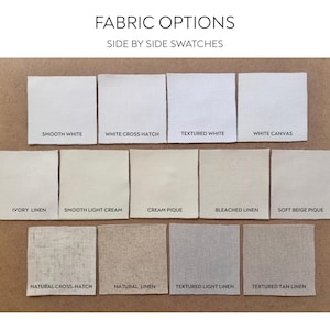 May include: Fabric swatches in various shades of white, cream, and beige. The image includes the text "FABRIC OPTIONS SIDE BY SIDE SWATCHES". The swatches are labeled with fabric names such as "Smooth White", "Ivory Linen", and "Natural Linen".