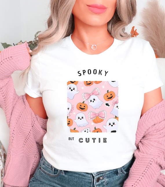 Coquette Pinkoween Graphic T-Shirt | Fall Season Cozy Vibes Tee | Ghost Pumpkin Trendy Aesthetic Shirt | Comfy Cute Soft Unisex Cotton Gift