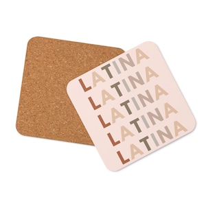 May include: A set of two pink coasters with the word "LATINA" repeated five times in different shades of brown, beige, and gray.