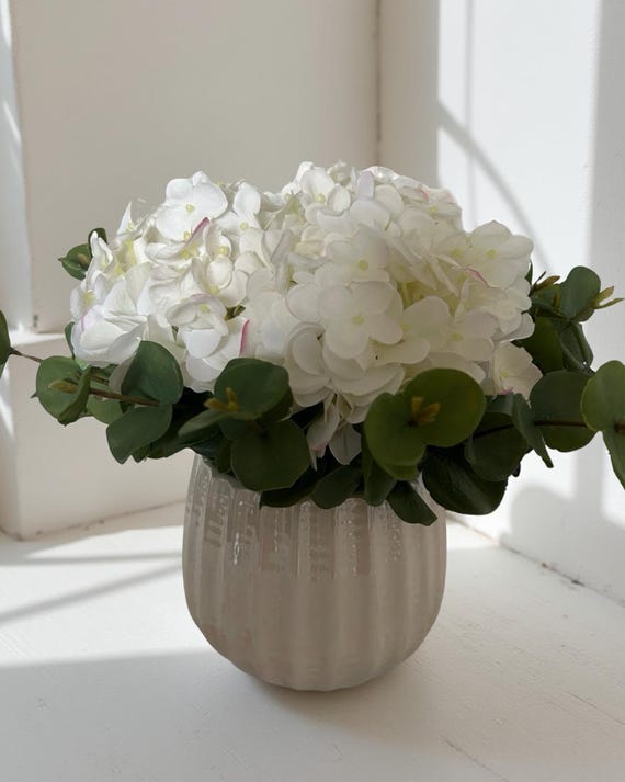 Artificial White Hydrangea Fresh Touch  With Eucalyptus In A White Ceramic Pot