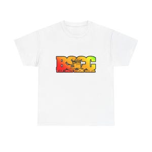 May include: White t-shirt with a colorful graphic that says "BSCC Black Singles Cruising Carnival".