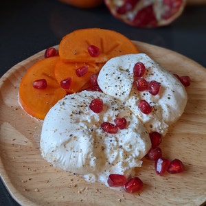 burrata on plate with fruit made with cheese making kit