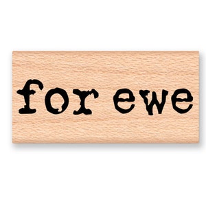 May include: Wooden stamp with the text "for ewe" in a vintage typewriter font.