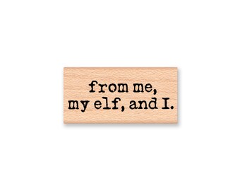 May include: Wooden stamp with the text "from me, my elf, and I."