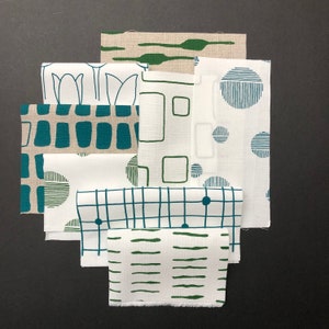 sample packs hand screen printed fabrics on linen and cotton teal, forest