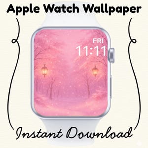 Op de afbeelding: Witte Apple Watch met een roze en witte wallpaper met een besneeuwd pad met bomen en lantaarns. De tijd is 11:11 uur op vrijdag. Tekst: "Apple Watch Wallpaper" en "Instant Download".