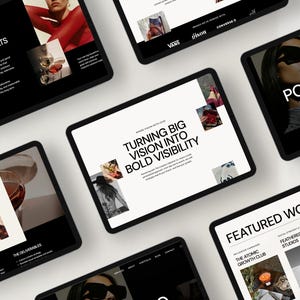 May include: A collection of black tablets displaying website designs with a white background. The tablets showcase text and images, including the phrases "Strategy That Disrupts. Results That Deliver" and "Turning Big Vision Into Bold Visibility."