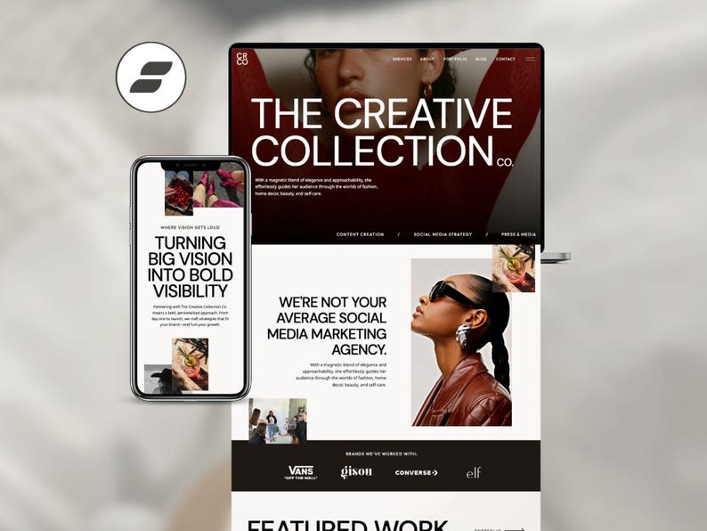 May include: A laptop and smartphone display a website design for "The Creative Collection Co." The website features a modern design with a bold red and white color scheme. The smartphone screen displays the text "Turning Big Vision Into Bold Visibility."