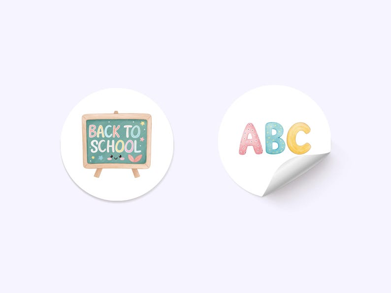 May include: Two round stickers with a school theme. One sticker features a small chalkboard with the words "BACK TO SCHOOL" and a cute face. The other sticker has the letters "ABC" in pastel colours.